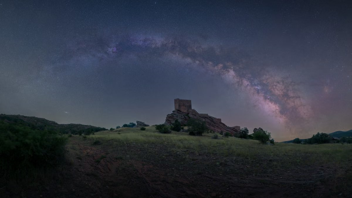 Stunning long exposure of the Milky Way above Castillo de Zafra, Campillo de Dueñas, Spain.